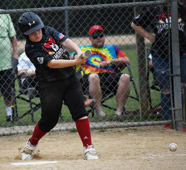 Aiden Cremer of the Mt. Orab Diamondbacks bounces the ball in front of the plate during an at-bat in an East Region Knothole Baseball Class B Senior playoff game June 29, 2023, at Finley Ray Park in Milford.