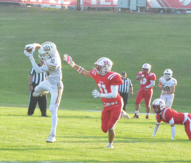 Western Browns Isaiah Smith grabs a reception in the Broncos week one win at Hillsboro, Aug. 17. Photo by Wade Linville