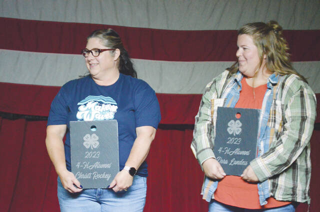 Receiving this years 4-H Alumni awards were Christi Rockey, left, and Dara Landess, right. Photo by Wade Linville