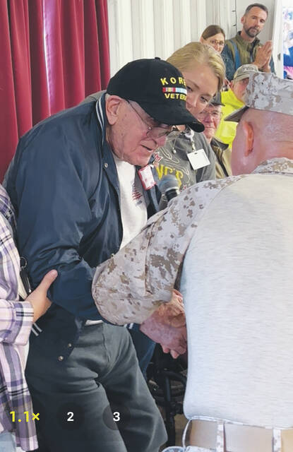 Jim Hanselman, a 100-year-old Korean War Veteran, is recognized by Colonel Dan Bubp (U.S.M.C.R. ret.) during this years Brown County Fair Veterans Recognition Program held Sept. 28. Photo by Wade Linville