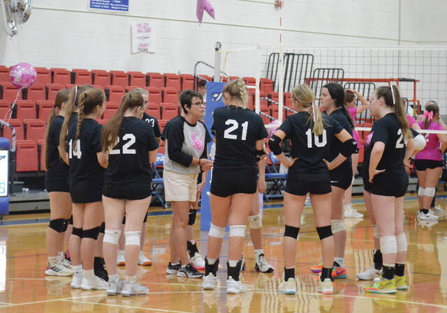 Fayetteville head volleyball coach Sharon Sheets instructs her Lady Rockets during the Volley for the Cure match in Ripley on Oct. 4. Photo by Wade Linville