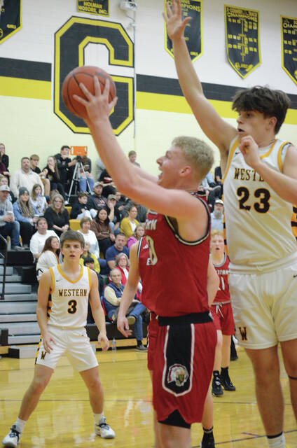 Easterns Luke Haney goes up for a score in the 2023 Brown County Holiday Tournament varsity boys championship game against Western Brown on Dec. 29. Photo by Wade Linville