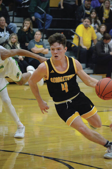 Georgetowns Ryland Hayslip penetrates to the hoop during the 2023 Brown County Holiday Tournament. Photo by Wade Linville