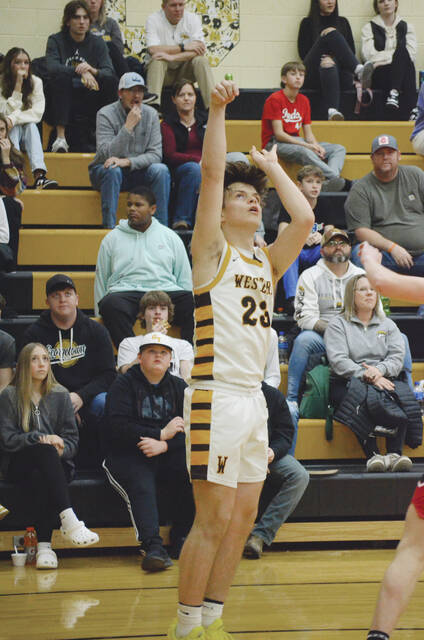 Western Browns Connor Gulley follows through on a shot during a Bronco win this season. Photo by Wade Linville