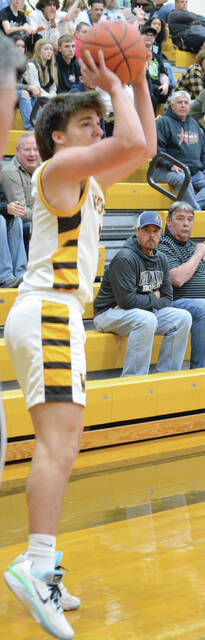 Western Browns Jet Jamison launches a shot from three-point range during a game this season. Photo by Wade Linville