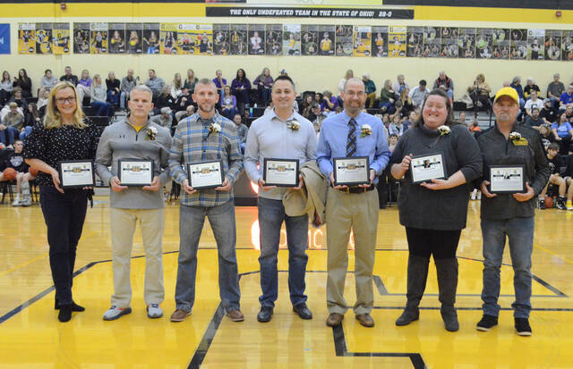 Georgetown High School inducted two individuals and one relay team into its athletic hall of fame on Feb. 2. From the left, Tracy Hawkins (accepting award on behalf of Coach Vern Hawkins), Cory Cahall, Zac Corbin, Coy Paeltz, Tom Grennan, Mindy Gardner Hastings, and Bill White (accepting award on behalf of Gary White). Photo by Wade Linville