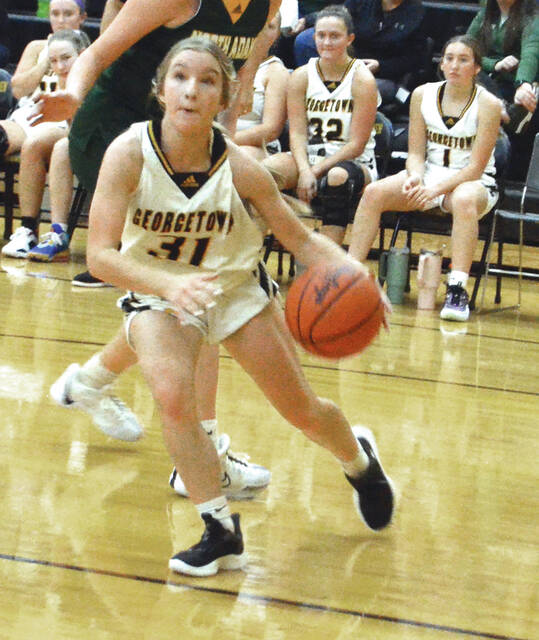 Georgetown freshman Josie McKibben drives to the hoop during a game this season. Photo by Wade Linville