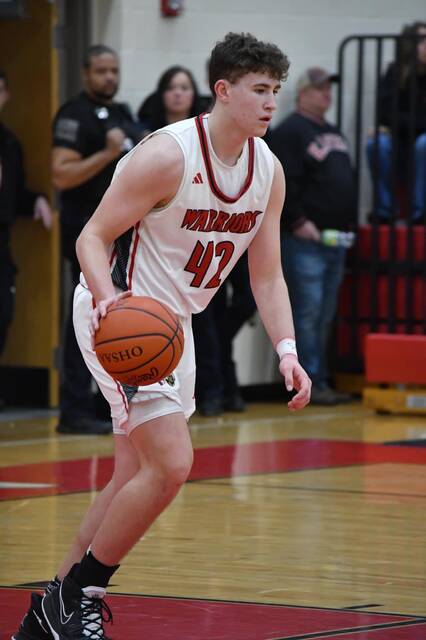 Eastern sophomore Grady Barber shot for 20 points to lead the way in scoring against Portsmouth West while also pulling down 11 rebounds for a double-double. Photo provided