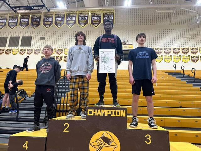 Western Brown junior Nathan Hite (second from the left) placed second overall in the 120-pound weight class at the Southwest District Division II Sectional Wrestling Tournament on Feb. 24, advancing to the district tournament at Wilmington High School. Above, Hite stands second on the podium at the sectional tourney. Photo provided