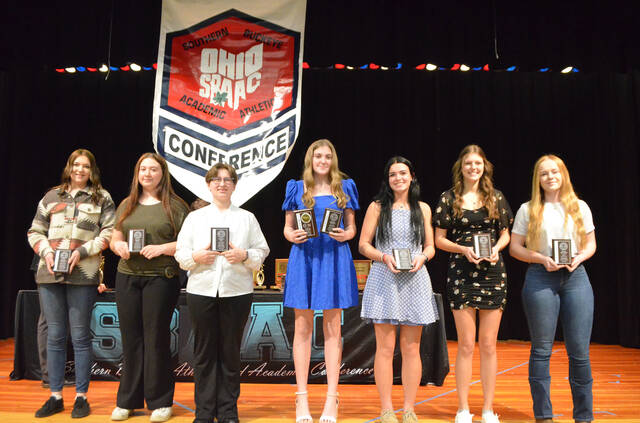This years Southern Buckeye Athletic/Academic Conference National Division First Team of girls bowling all-stars pose with their awards. From the left, Shelby Bergfeld (Williamsburg), Melanie Liming (Georgetown), Heather King (Georgetown), Carolyn Edmisten (Georgetown), Kimberly Lighthall (Clermont Northeastern), Katelyn Toles (Blanchester), and Kaylee Randolph (Bethel-Tate).