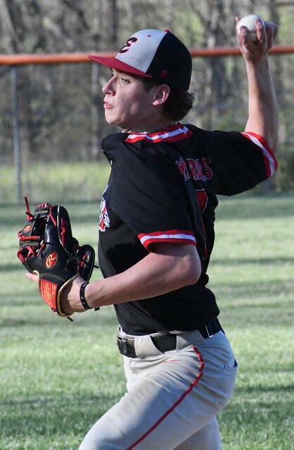 The Eastern Warriors are back in action, kicking off their spring season with a win over Felicity-Franklin on March 23. Pictured above, Eastern senior Wyatt Haupt delivers a pitch.