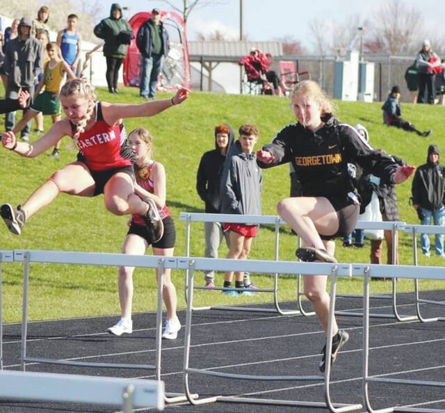 High school girls compete in the hurdles at this years Georgetown Season Kickoff track and field meet.