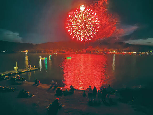 Many gathered on the banks of the Ohio River in Ripley to watch the Ripley Lions Club Fourth of July Festival fireworks show on June 29. Photo by Wade Linville