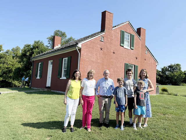During Ohio Governor Mike DeWines Aug. 11 visit to Brown County with First Lady Fran DeWine and other family members for two ground breakings on local projects funded through the Appalachian Community Grant Fund, they enjoyed a tour of the historic home of John Rankin in Ripley. Serving as their tour guide was Ripley native Jaki Royal. Photo by Wade Linville