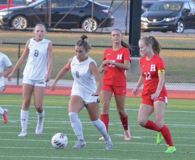 Western Browns Audrey West delivers a pass in the Lady Broncos Sept. 15 win at Hillsboro. Photo by Wade Linville