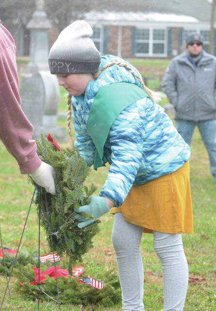 Members of Scout 4074 of Russellville assisted in the placing of the wreaths for the 2025 Wreaths Across America Day event held at Ripleys Maplewood Cemetery on Dec. 13. Photo by Wade Linville