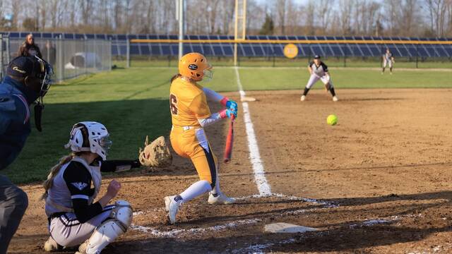 Western Browns Jayci Barnes hammers out a hit during a game this season. Photo by Titus Green