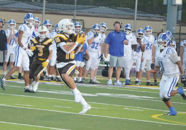 Western Browns Deon Bradford grabs a touchdown reception in the Broncos week three game against Chillicothe, Sept. 4. Photo by Wade Linville
