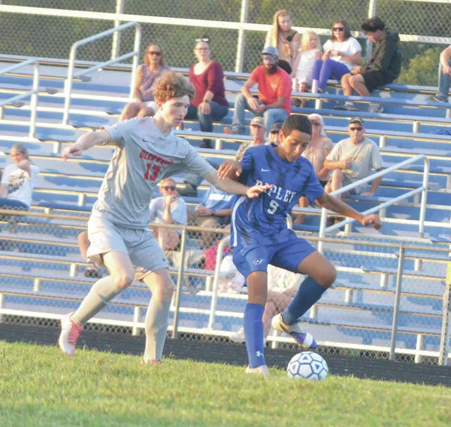 Ripleys Zak Belasri makes his way past a Glenwood defender during the Sept. 11 match at Ripley. Photo by Wade Linville
